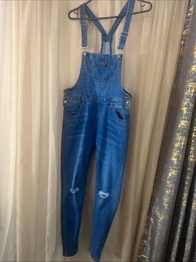 Women’s blue jean overalls.